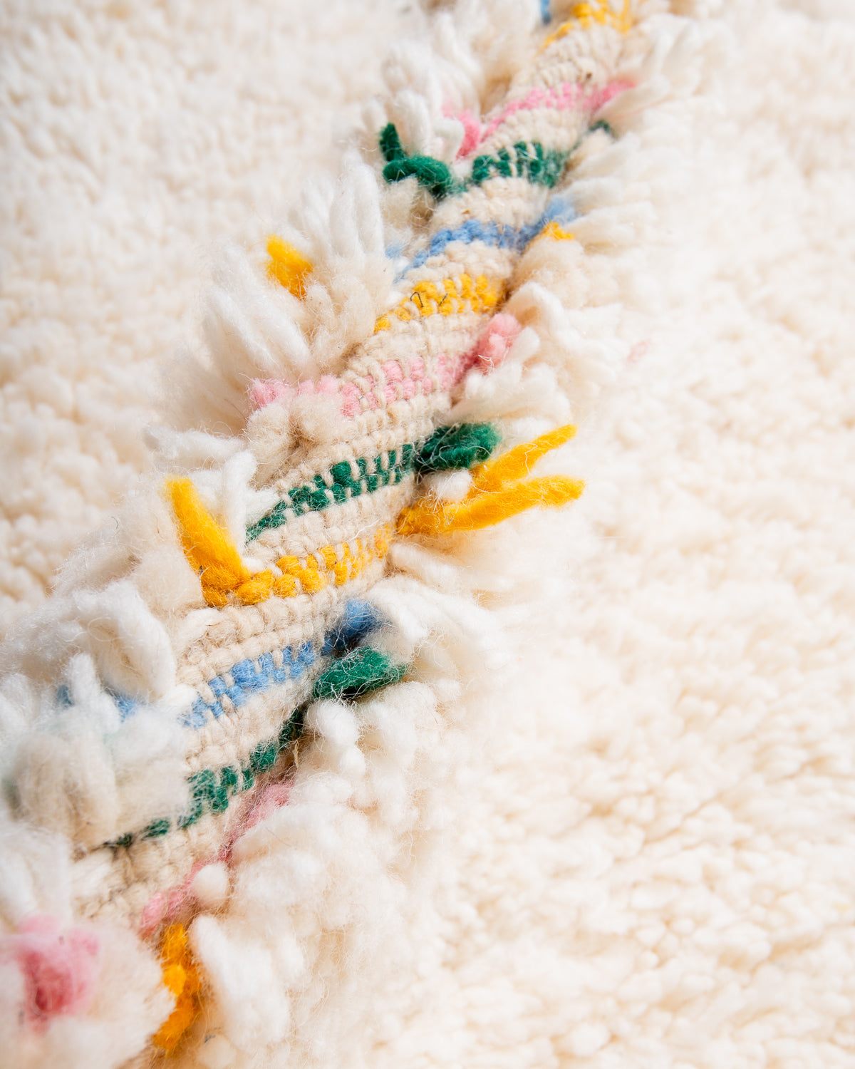 Modern, designer, handcrafted Berber rug from Morocco. Beniourain carpet with beautiful colours and patterns and fluffy wool texture.